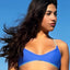 Bikini Flavors model wearing Reversible Cross-Back bikini top by Bikini Flavors.