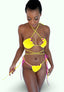 BIkini Flavors model wearing Ruffled Reversible Triangle Top and Bermuda Bottoms in Strawberry Sunrise