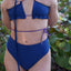 Cropped view of bikini flavors reversible ruffle triangle top and high waist bottoms in plum pretty.