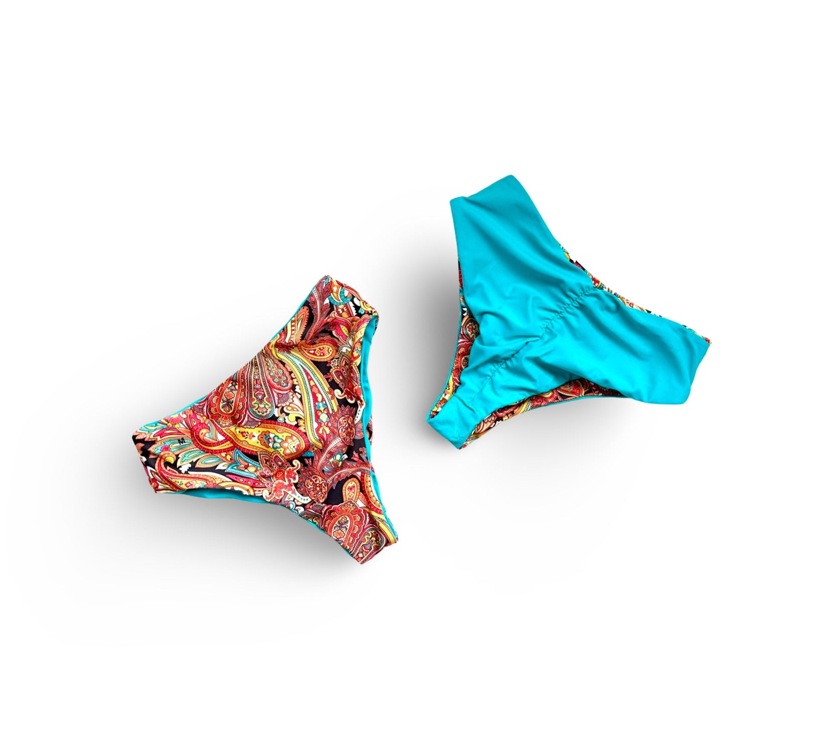 Reversible High waist cheeky bikini bottoms by Bikini Flavors shown in Oolong.  Turquoise reverses to paisley print.  American Made. 