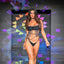 Bikini Flavors model walks the runway wearing a hand-made knit string bikini bottom