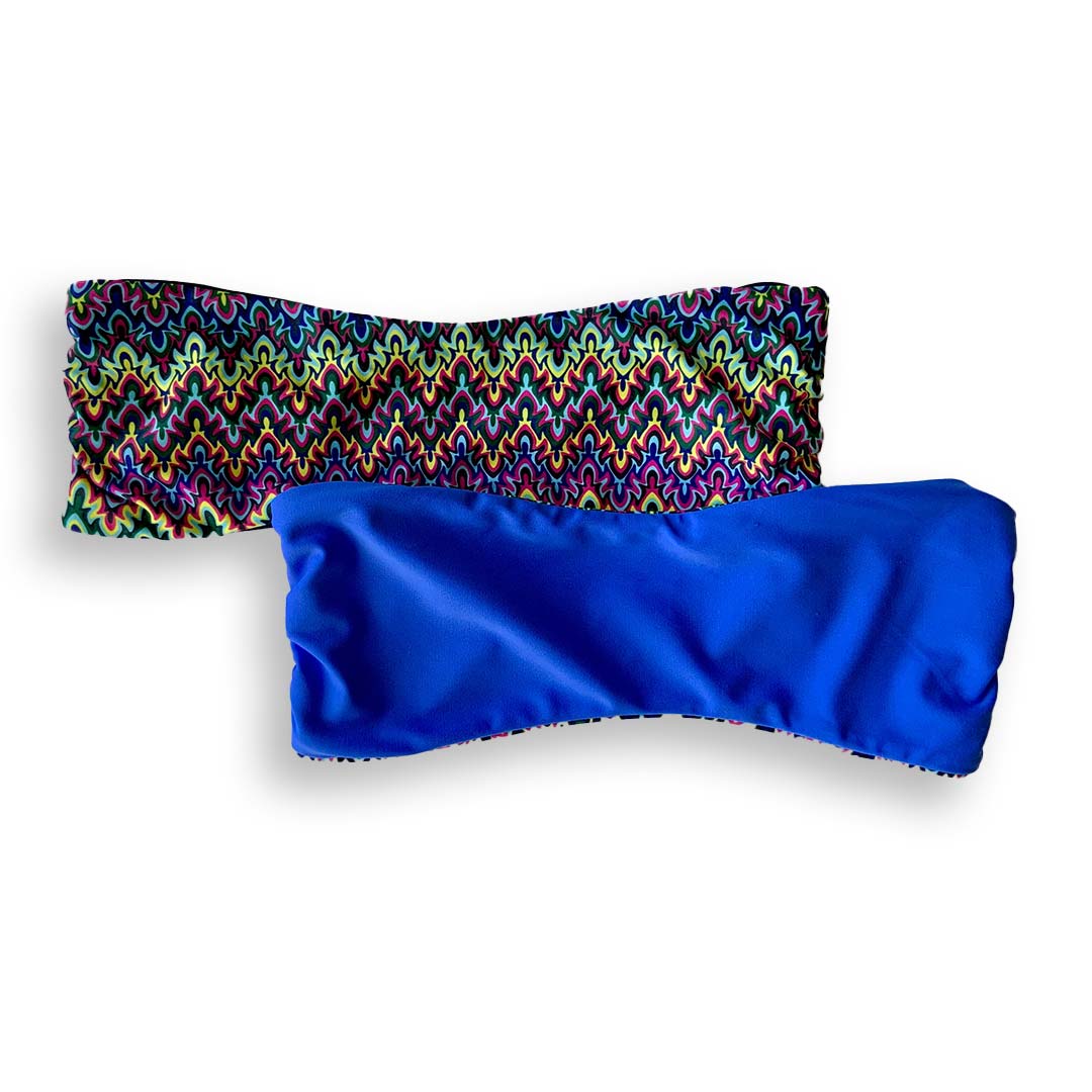 Reversible bandeau bikini top shown in Blue Sapphire.  Colorful print reverses to periwinkle blue.  American Made. 