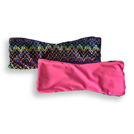 Flat lay photo of Bikini Flavors reversible bandeau bikini top in Pink Sapphire.  American Made. 