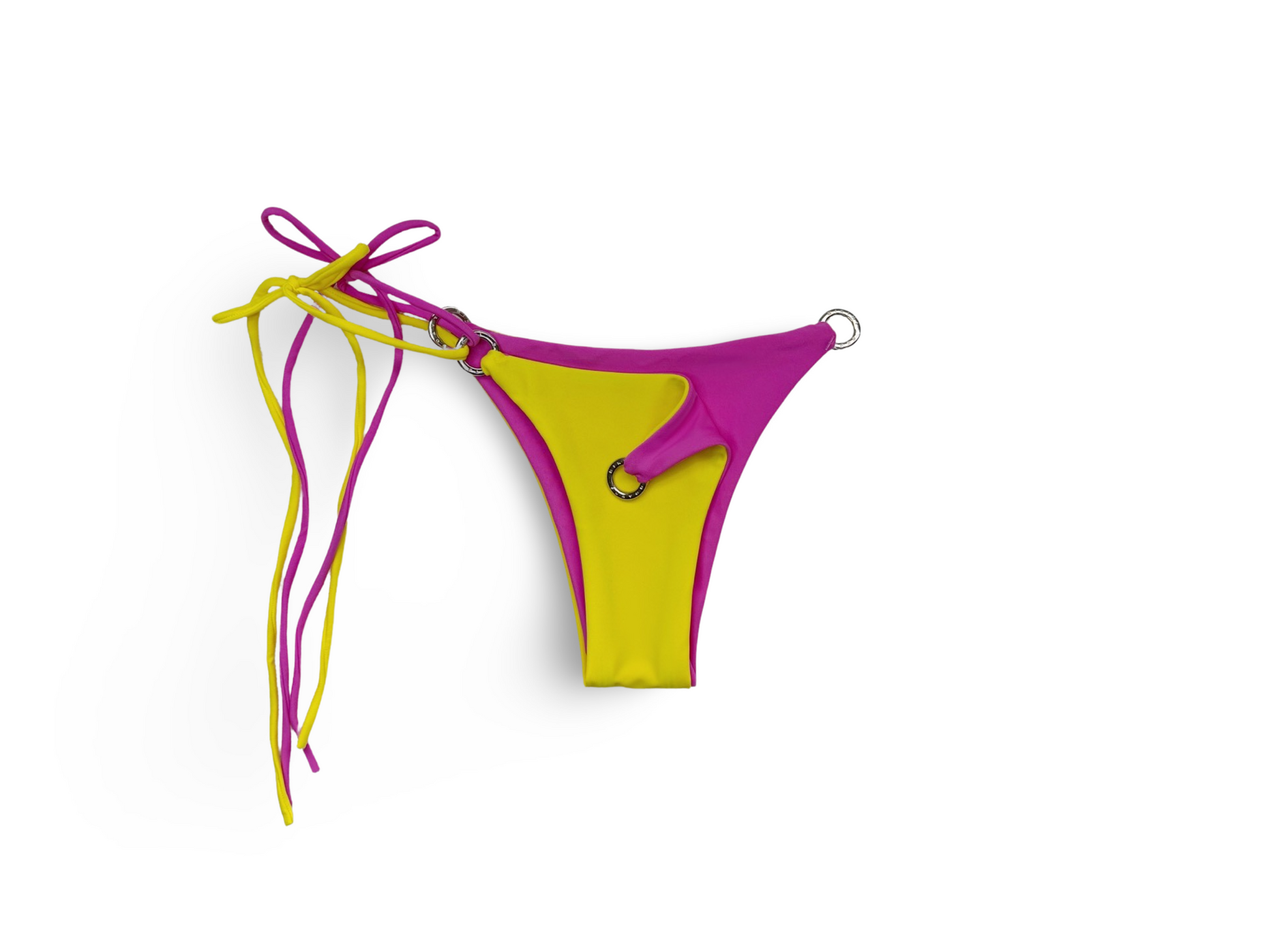 Reversible Brazilian bikini bottom in Strawberry Sunrise by Bikini Flavors.  Yellow reverses to pink. Interchangeable ties, signature hardware.  American Made. 