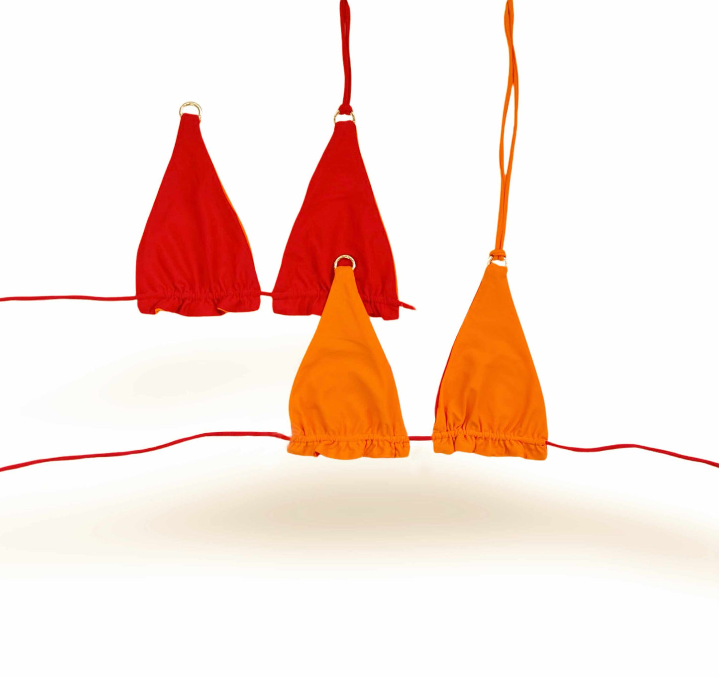 Berry Breeze reversible ruffled triangle top. Red reverses to orange. Interchangeable strings. American made.